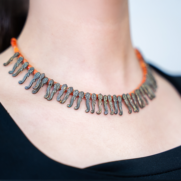 Bedouin with coral stone and silver necklace