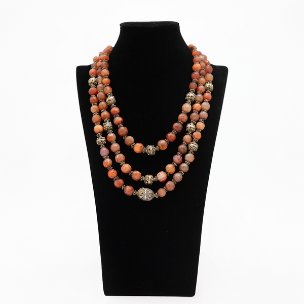 Antique glass with silver necklace