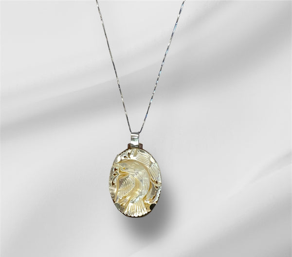 Handmade Bethlehem mother of pearl peace bird necklace